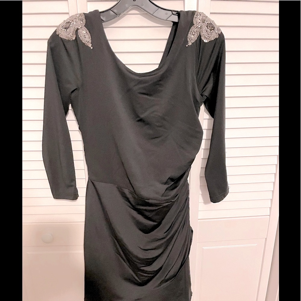 Mini black dress with embellished shoulders